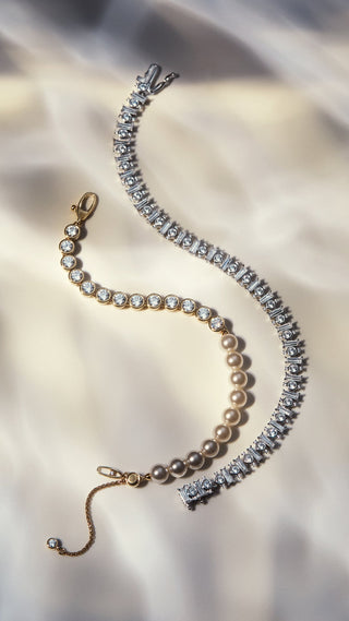 NADRI UNDER THE SEA MIXED LINE BRACELET AND UNDER THE SEA MOSIAC LINE BRACELET, LAID OUT AGAINST A WHITE BACKGROUND WITH WATER SHADOWS CASTED ON THE PIECES