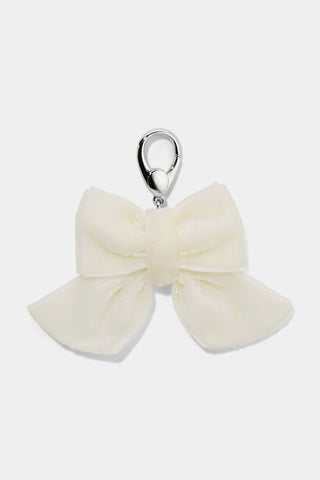 CLEOPAWTRA WHITE BOW CHARM IN A SILVER TONE