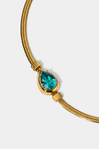 CLOSE UP OF THE PEAR STONE ON THE DELANCEY AQUA PEAR LINE BRACELET