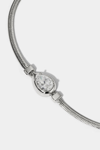 CLOSE UP OF THE PEAR STONE ON THE DELANCEY PEAR LINE BRACELET IN RHODIUM PLATING