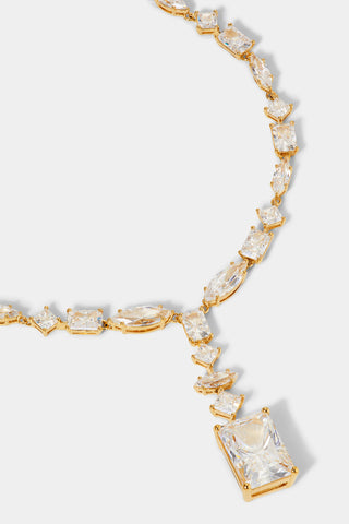 CLOSE UP DETAIL SHOT OF RARE JEWELS MIXED-CUT CZ STATEMENT Y NECKLACE IN GOLD PLATING.