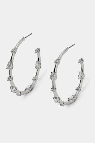 HERA ELONGATED C HOOP EARRINGS IN RHODIUM PLATING