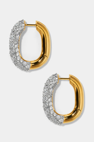 TURN UP THE VOLUME OVAL HOOP EARRINGS IN GOLD AND RHODIUM