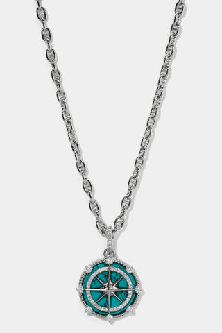 NADRI’S GLOBE TROTTER TURQUOISE COMPASS PENDANT NECKLACE IN RHODIUM PLATING