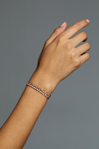 LUXOR CZ LINE BRACELET ON MODEL. THE IMAGE IS OF HER ARM WITH BRACELET ON THE WRIST. 