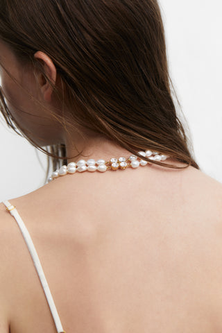 BACK VIEW OF MODEL WEARING MADRID FRESHWATER PEARL DOUBLE STRAND NECKLACE 