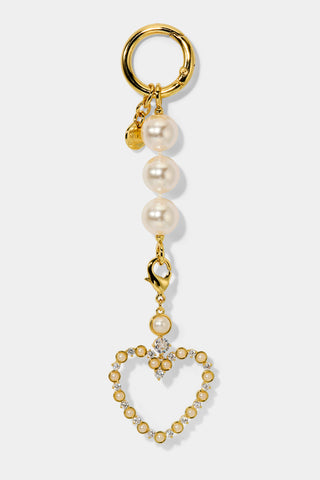 Gold-plated and pearl bag charm with heart design.
