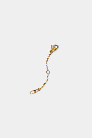 Gold chain extender with lobster clasp on a white background