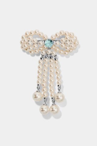 CEREMONY SWAG AQUA PEARL BOW PIN BAG CHARM IN RHODIUM PLATING
