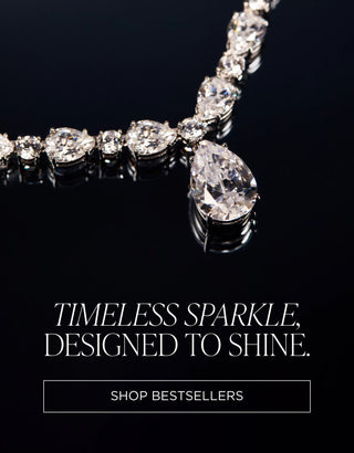CZ necklace with 'Timeless Sparkle, Designed to Shine' text and 'Shop Bestsellers' button on a dark background.