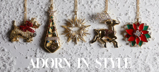 Nadri Christmas ornaments on a textured white background with 'Adorn in Style' text. Ornaments include a scotty dog, an old world santa, a sunburst adorned with pearls, a reindeer, and a poinsettia.